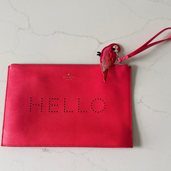 kate spade Handbags - Kate Spade Red Wristlet with Parrot Accent